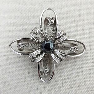 Spun Wire Flower Brooch Hematite Center Stone